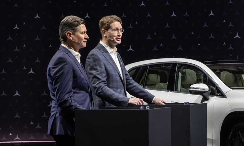 Ola Kallenius (right) is pictured during a news conference for Mercedes's annual results on Friday alongside CFO Harald Wilhelm